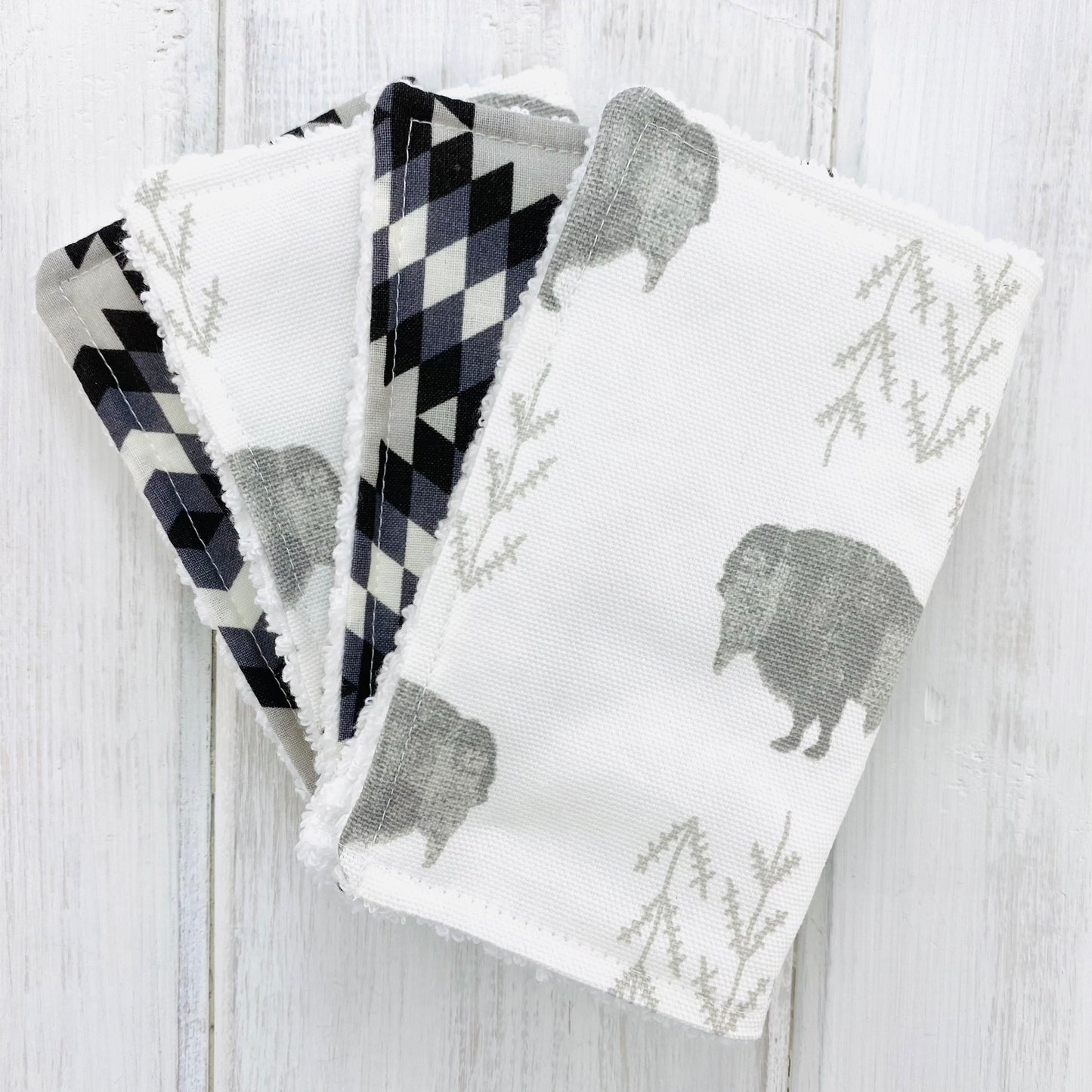Sustainable washing cloths, reusable baby wipes, set of 4 handmade in southwest and bison fabrics.
